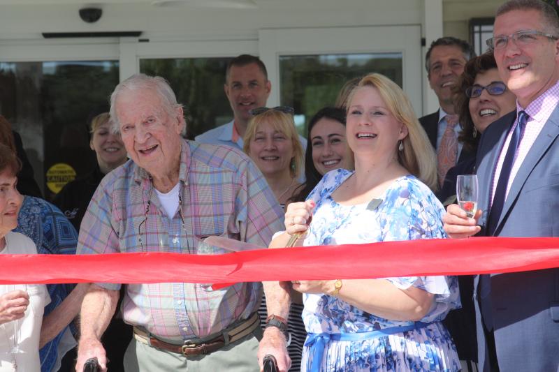 All-American Assisted Living facility resident Jack Boeing and its Community Relations Director Virginia Lehr were among those at Thursday's ribbon cutting ceremony. BY MATTHEW BERNAT